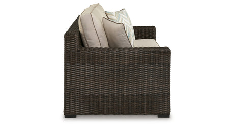Coastline Bay Brown Outdoor Loveseat with Cushion from Ashley - Luna Furniture