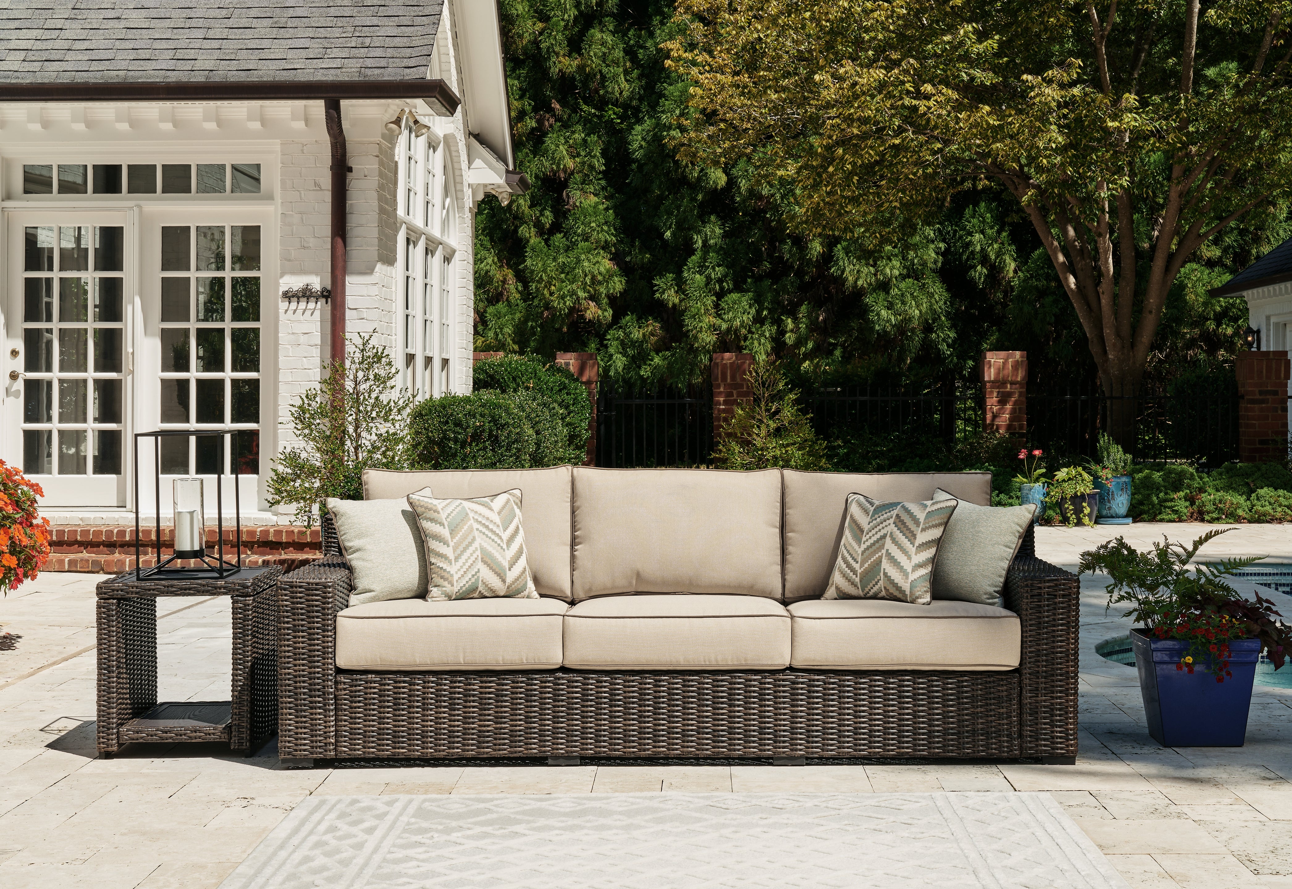 Ashley Coastline Bay Brown Outdoor Sofa with Cushion - Luna Furniture