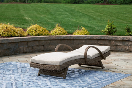 Beachcroft Beige Outdoor Chaise Lounge with Cushion from Ashley - Luna Furniture