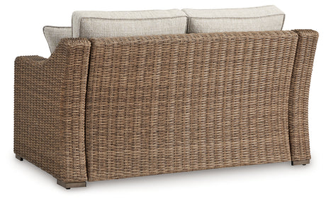 Beachcroft Beige Outdoor Loveseat with Cushion from Ashley Furniture - Luna Furniture
