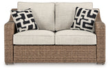 Beachcroft Beige Outdoor Loveseat with Cushion from Ashley Furniture - Luna Furniture
