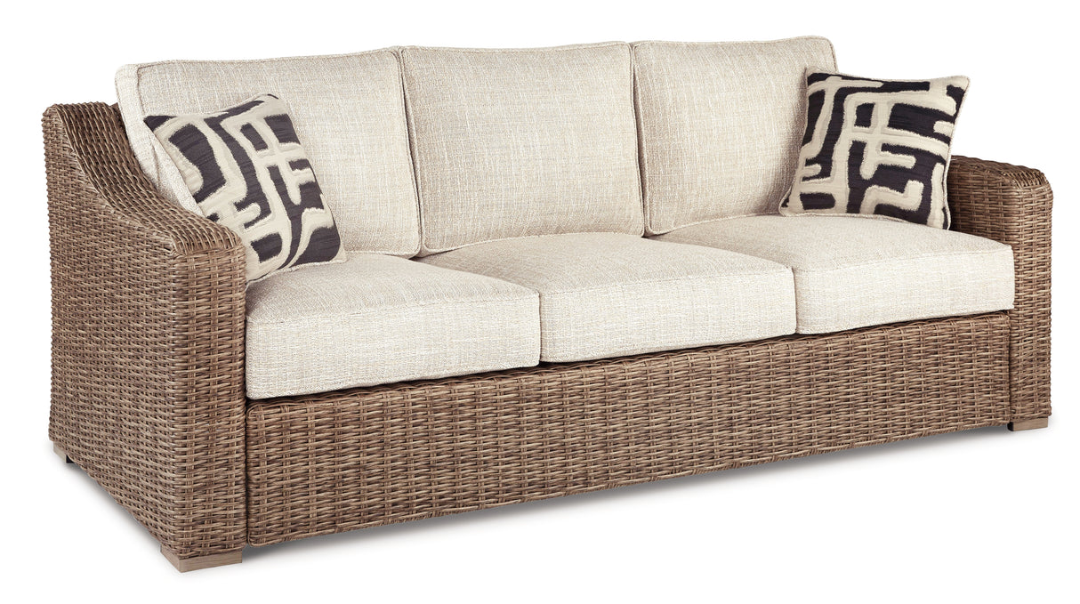 Beachcroft Beige Outdoor Sofa and 2 Lounge Chairs with Fire Pit Table from Ashley Furniture - Luna Furniture