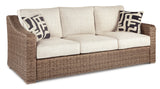 Beachcroft Beige Outdoor Sofa and 2 Lounge Chairs with Fire Pit Table from Ashley Furniture - Luna Furniture