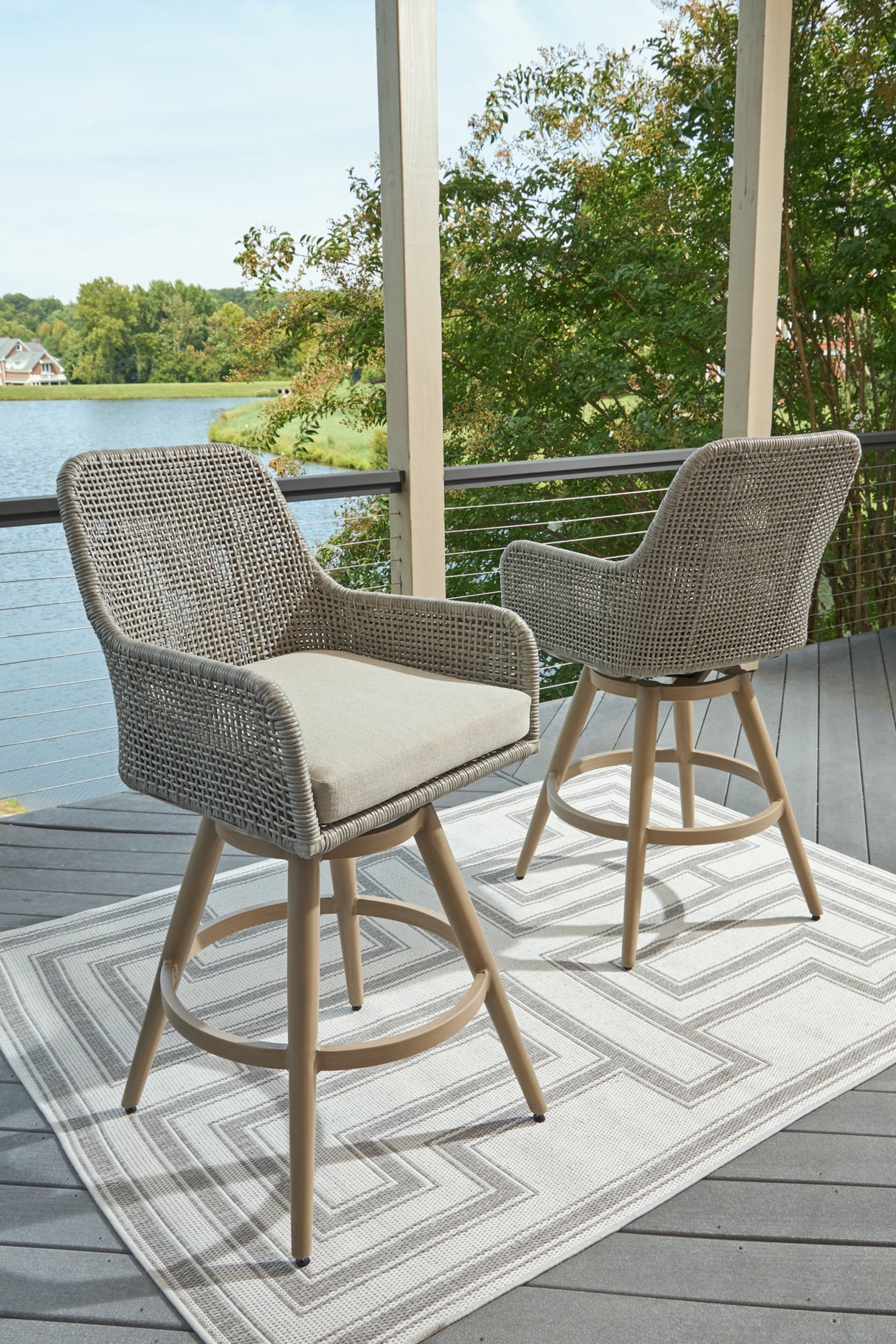 Seton Creek Beige/Gray Outdoor Bar Height Barstool with Cushion (Set of 2) from Ashley Furniture - Luna Furniture
