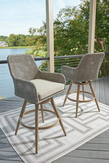 Seton Creek Beige/Gray Outdoor Bar Height Barstool with Cushion (Set of 2) from Ashley Furniture - Luna Furniture