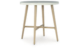 Seton Creek Beige Outdoor Bar Table from Ashley Furniture - Luna Furniture