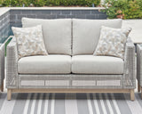 Seton Creek Outdoor Sofa and Loveseat with Coffee Table in Gray from Ashley Furniture - Luna Furniture