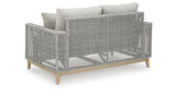 Seton Creek Outdoor Sofa and Loveseat with Coffee Table in Gray from Ashley Furniture - Luna Furniture