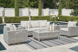 Seton Creek Outdoor Sofa and 2 Chairs with Coffee Table in Gray from Ashley Furniture - Luna Furniture