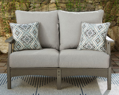 Visola Gray Outdoor Loveseat with Cushion from Ashley Furniture - Luna Furniture