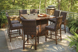 Paradise Trail Medium Brown Outdoor Counter Height Dining Table with 6 Barstools from Ashley - Luna Furniture