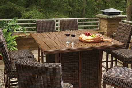 Paradise Trail Medium Brown Outdoor Counter Height Dining Table with 6 Barstools from Ashley - Luna Furniture