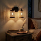 Quell 2-Light Rattan Wall Sconce with Black Metal Finish from Ashcroft Furniture - Luna Furniture