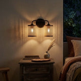Quell 2-Light Rattan Wall Sconce with Black Metal Finish from Ashcroft Furniture - Luna Furniture
