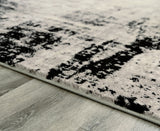 Zekeman Black/Cream/Gray Medium Rug from Ashley Furniture - Luna Furniture