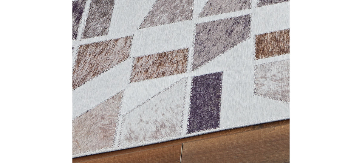 Jettner Multi 7'10" x 10' Rug from Ashley Furniture - Luna Furniture