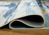 Vinlett Cream/Blue/Brown Washable Medium Rug from Ashley Furniture - Luna Furniture