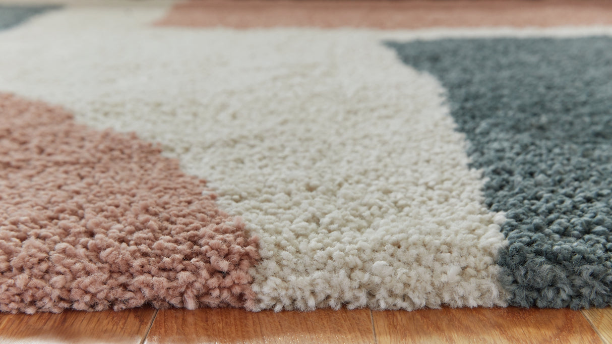 Flynnwick Cream/Pink/Gray Medium Rug from Ashley Furniture - Luna Furniture