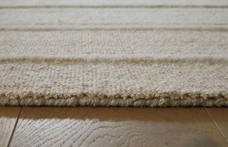 Teelgan Ivory/Tan Extra Large Rug from Ashley - Luna Furniture
