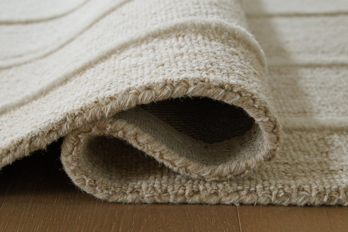 Teelgan Ivory/Tan Extra Large Rug from Ashley - Luna Furniture