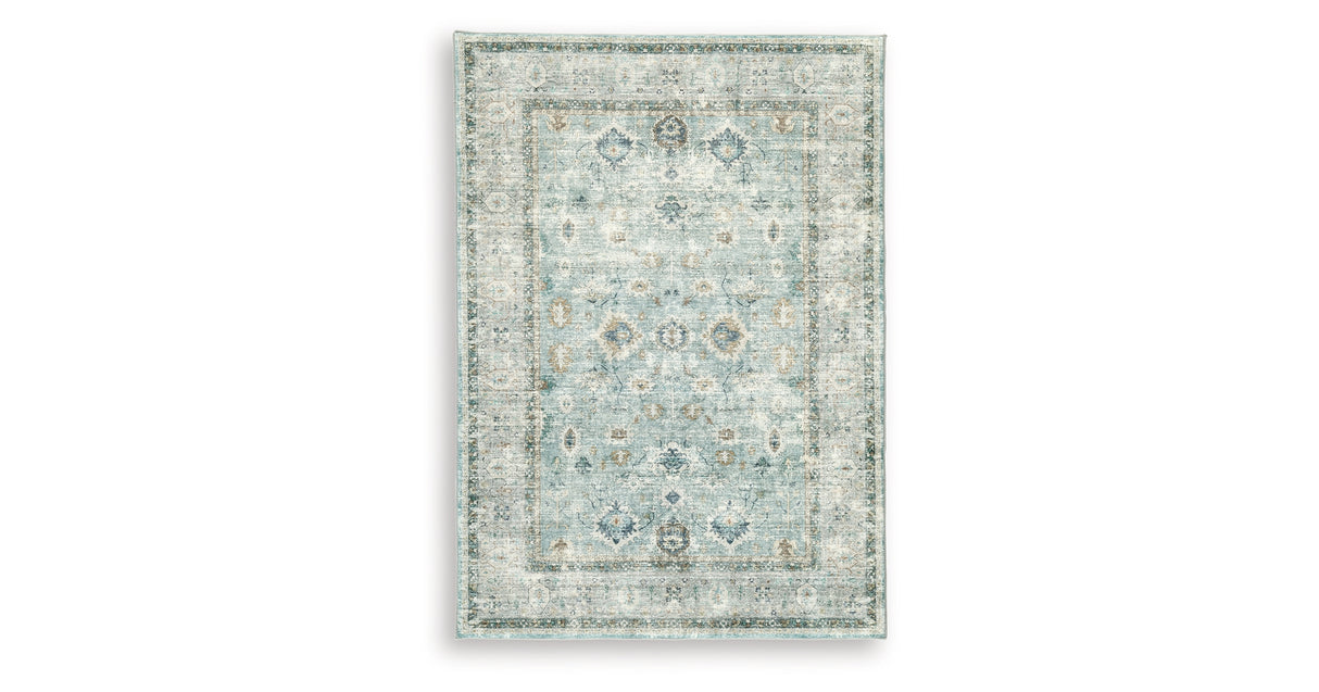Ladstoney Teal/Beige/Ochre Medium Rug from Ashley Furniture - Luna Furniture