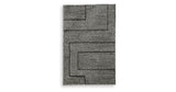 Kurtmen Black/Ivory Medium Rug from Ashley Furniture - Luna Furniture