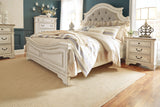 Realyn Chipped White California King Upholstered Panel Bed from Ashley - Luna Furniture