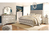 Realyn Chipped White King Upholstered Sleigh Bed from Ashley - Luna Furniture