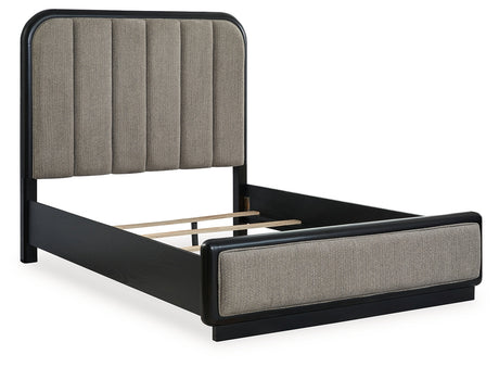 Rowanbeck Queen Upholstered Panel Bed with Mirrored Dresser and Chest in Gray/Black from Ashley - Luna Furniture