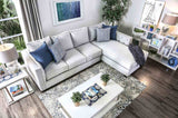 Ornella Light sectional sofa, L-shaped layout with blue pillows, angled room view