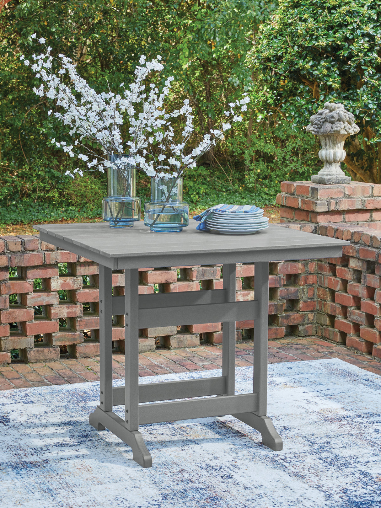 Sanctuary Beach Dark Gray Outdoor Counter Height Dining Table from Ashley Furniture - Luna Furniture