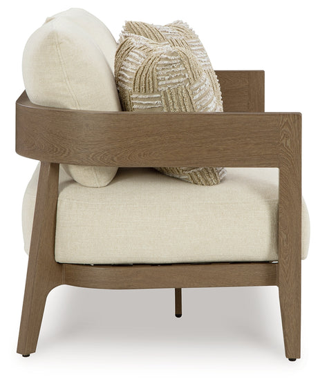Serene Bay Dark Brown/White Outdoor Loveseat with Cushion from Ashley Furniture - Luna Furniture