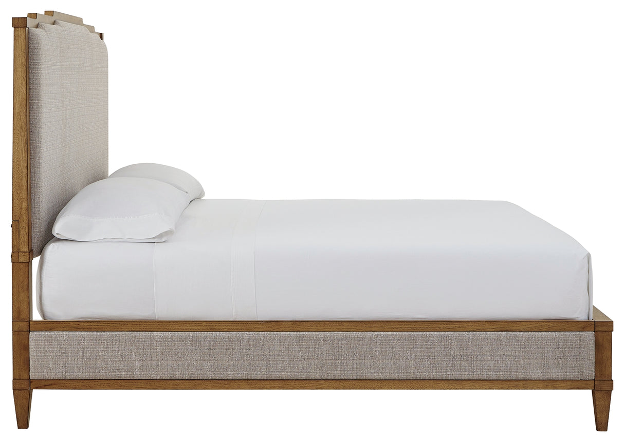 Sharlance King Upholstered Panel Bed with Mirrored Dresser, Chest and Nightstand in Light Brown from Ashley - Luna Furniture