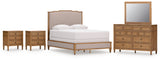 Sharlance Queen Upholstered Panel Bed with Mirrored Dresser and 2 Nightstands in Brown from Ashley Furniture - Luna Furniture