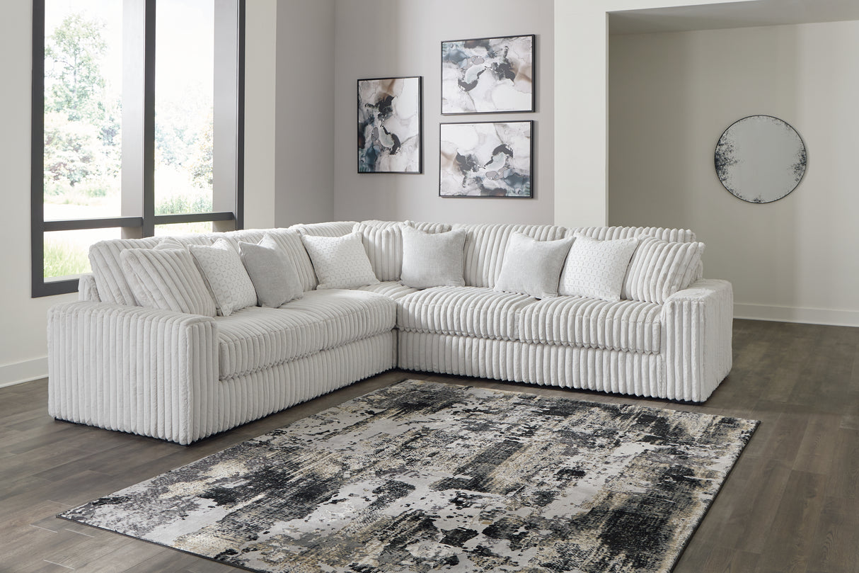 Stupendous Alloy 3-Piece Sectional with Ottoman from Ashley - Luna Furniture