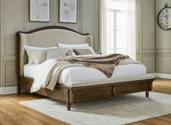 Sturlayne Brown Queen Upholstered Panel Bed with Footboard Bench