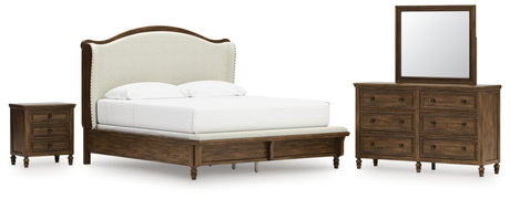 Sturlayne King Upholstered Panel Bed with Mirrored Dresser and Nightstand in Brown from Ashley - Luna Furniture