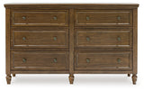 Sturlayne Queen Upholstered Panel Bed with Dresser and 2 Nightstands in Brown from Ashley - Luna Furniture