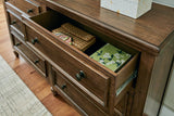 Sturlayne Queen Upholstered Panel Bed with Dresser and 2 Nightstands in Brown from Ashley - Luna Furniture