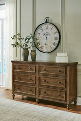 Sturlayne Queen Upholstered Panel Bed with Dresser and 2 Nightstands in Brown from Ashley - Luna Furniture