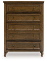 Sturlayne Queen Upholstered Panel Bed with Mirrored Dresser, Chest and 2 Nightstands in Brown from Ashley - Luna Furniture