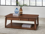 Trenmour Medium Brown Coffee Table from Ashley - Luna Furniture