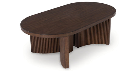 Korestone Dark Brown Coffee Table from Ashley Furniture - Luna Furniture