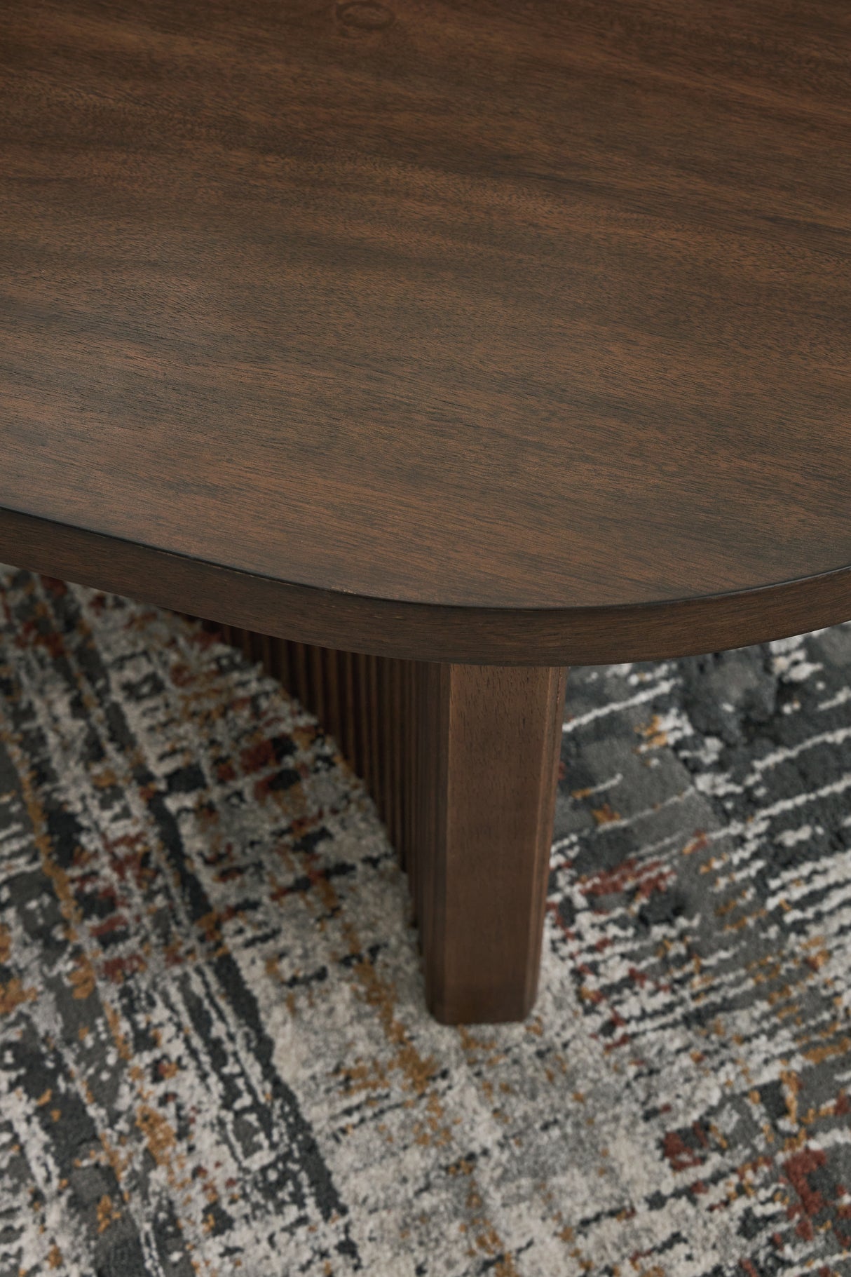Korestone Dark Brown Coffee Table and 2 End Tables from Ashley - Luna Furniture