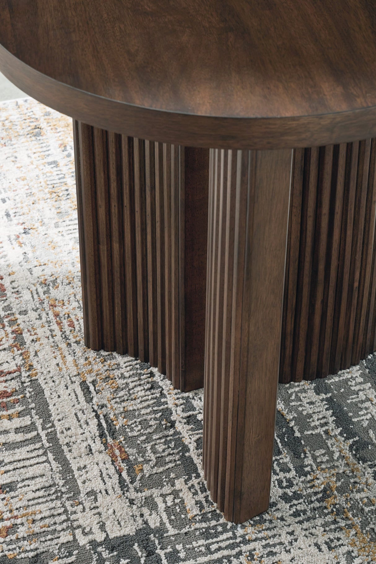 Korestone Dark Brown Coffee Table and 2 End Tables from Ashley - Luna Furniture