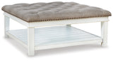 Kanwyn Whitewash Upholstered Ottoman Coffee Table from Ashley Furniture - Luna Furniture