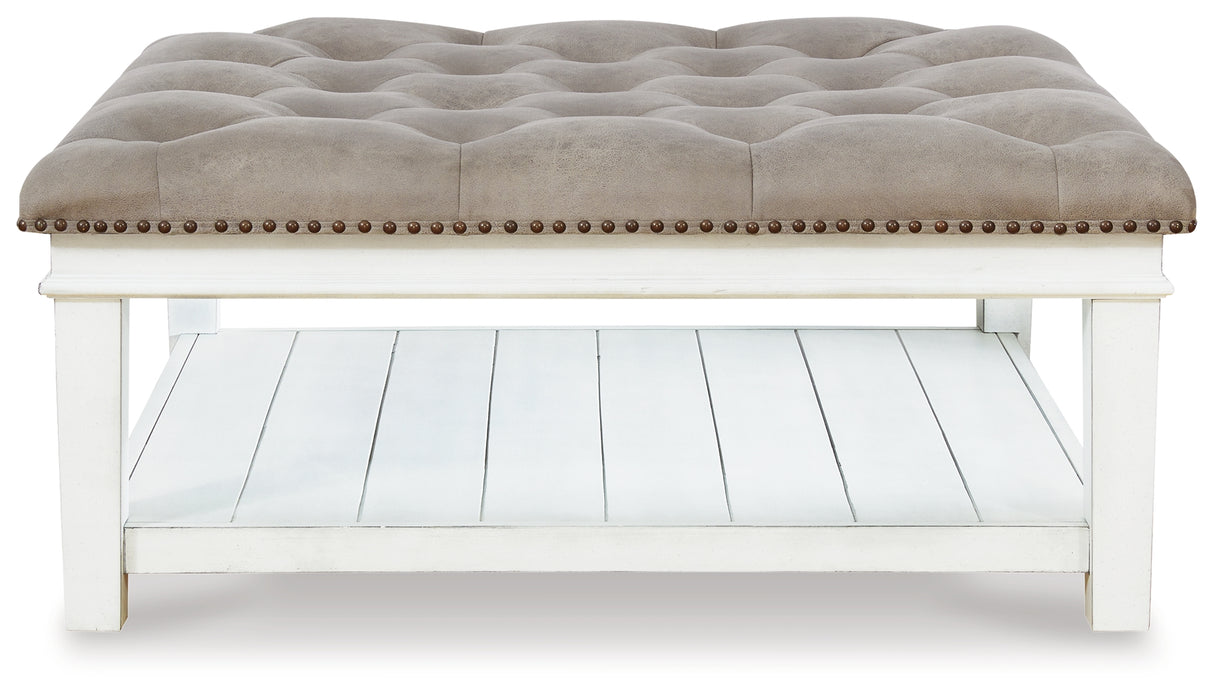 Kanwyn Whitewash Upholstered Ottoman Coffee Table from Ashley Furniture - Luna Furniture