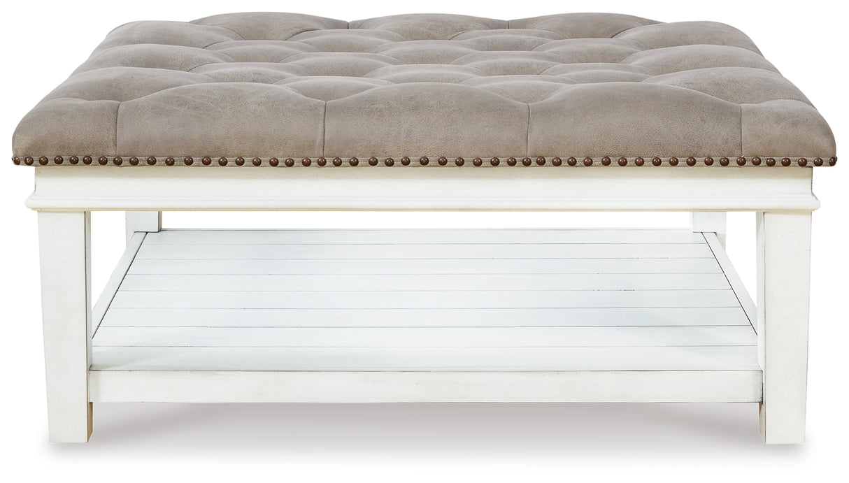 Kanwyn Whitewash Upholstered Ottoman Coffee Table from Ashley Furniture - Luna Furniture