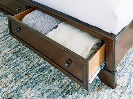 Trellington Brown Queen Sleigh Storage Bed from Ashley - Luna Furniture