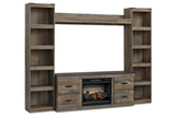 Trinell Brown 4-Piece Entertainment Center with Electric Fireplace from Ashley - Luna Furniture